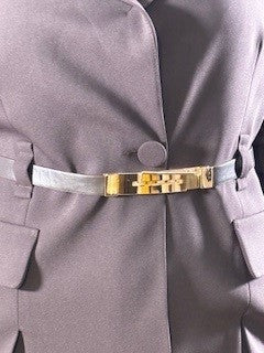 Suit, black jacket with front slits and belt, black pants