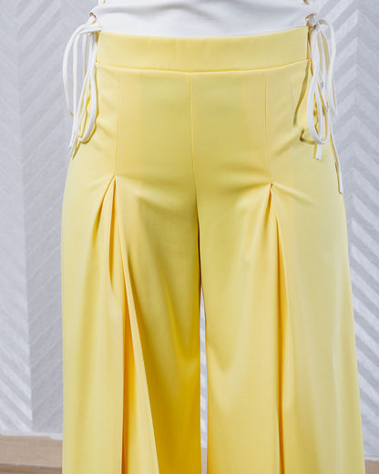 FlowForm | Kiwe by Gizia Pleated Relaxed Fit Trousers – Available in Yellow and Black